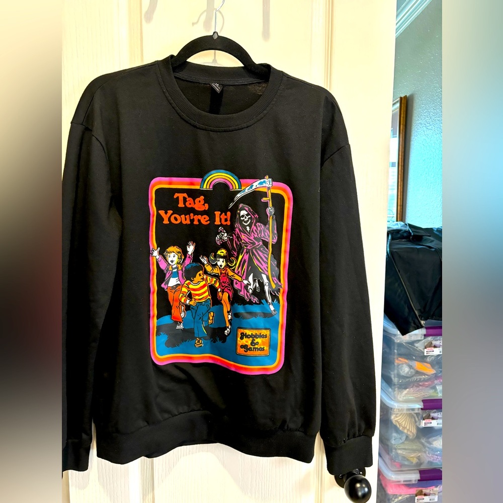 Halloween sweatshirt. Size medium. New without tags.